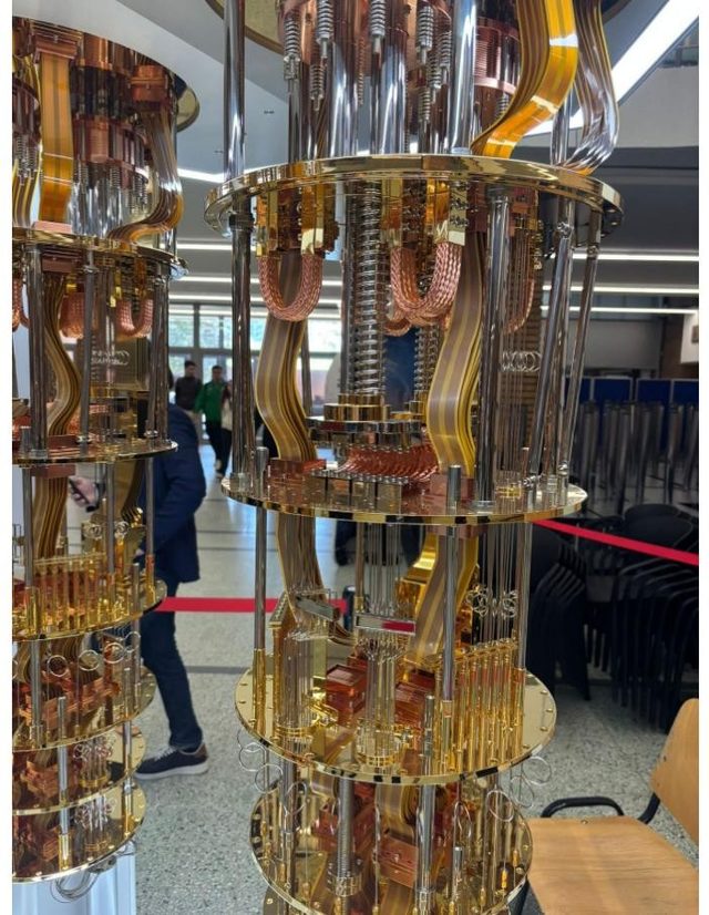 <a href="https://www.ibm.com/quantum/hardware" target="_blank" rel="noopener">IBM Quantum System Two</a> exhibit with FreeYa Mind Campus branding, May 2026 (photos: Valentin Mureșan)